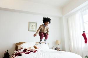 Read more about the article Joyful Leaps: A Ballet of Laughter in a Toddler’s Haven